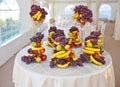 Wedding decoration with fruits, bananas, grapes and apples Royalty Free Stock Photo