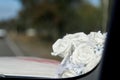 Wedding decoration on the glass of a car