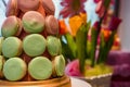 Dessert. Sweet colorful macarons or macaroons and flower gypsophila. Royalty Free Stock Photo