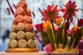 Dessert. Sweet colorful macarons or macaroons and flower gypsophila. Royalty Free Stock Photo