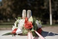 Wedding decoration, large rings on white and red roses Royalty Free Stock Photo