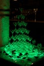 Wedding decoration. Slide with champagne, highlighted by different colors