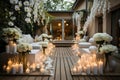 Wedding decoration of the villa\'s outdoor terrace with candles and white flowers