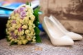 Wedding decorations and decorations, the bride`s bouquet, lies and waits until the bride wears her wedding dress