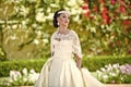 Wedding decorations. Bride in wedding diadem and white dress on sunny day Royalty Free Stock Photo