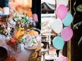 Wedding decorations collage with balloons, sweets and candles in restaurant Royalty Free Stock Photo