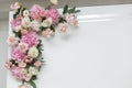 Wedding decorations. Holiday decoration vase with fresh flowers near the wedding arch. Pink roses and carnations Royalty Free Stock Photo