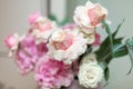 Wedding decorations. Holiday decoration vase with fresh flowers. Pink roses and carnations Royalty Free Stock Photo