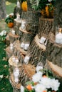 Wedding decorations in rustic style. Outing ceremony. Wedding in nature. Candles in decorated goblets Royalty Free Stock Photo