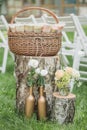 Wedding decorations in rustic style. Outing ceremony. Wedding in nature. Candles in decorated jars Royalty Free Stock Photo