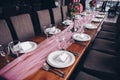 Wedding decorations. Table decorated with pink cloth