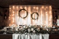 Wedding decorations on the wall, lights and plants
