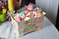 Wedding decorative box with colored candies and lollipops