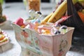 Wedding decorative box with colored candies and lollipops