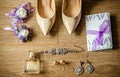 Wedding detail. Accessories for the bride. Shoes, rings, earrings,bracelet and boutonniere. Royalty Free Stock Photo