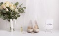 Bride accessories with bouquet and high heel shoes