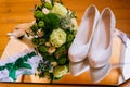 Wedding details, green Bridal bouquet, shoes, bride garter and earrings