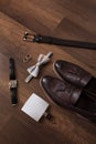 Wedding details. Groom accessories. Shoes, rings, belt, and bowtie