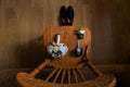 Wedding details. Groom accessories. Shoes, rings, boutonniere and watch on chair.