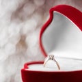 Wedding diamond ring in red heart shaped gift box Royalty Free Stock Photo