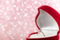 Wedding diamond ring in red heart shaped gift box Royalty Free Stock Photo