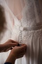 Wedding dress close-up. Bridal corset. The bride`s morning gathering. Royalty Free Stock Photo