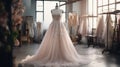 Wedding dress on a mannequin in a designer's studio with flowers, gentle powdery pink colors Royalty Free Stock Photo