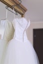 Wedding dress on mirror wardrobe Royalty Free Stock Photo