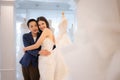 LGBT couple asian embracing each other after the bride tries on the wedding dress Royalty Free Stock Photo