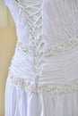 Wedding dress with tighting fabric