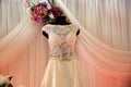 Wedding dresses on hangers and dummies