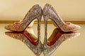 Wedding elegante luxury shoes on a mirror table, selective focus Royalty Free Stock Photo