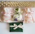 Wedding favor bags containing sugar-coated almonds , dates gift Royalty Free Stock Photo