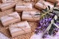 Wedding favors purple natural color decoration brown craft gift box with white burlap and jute ribbon Royalty Free Stock Photo