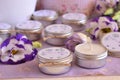 Wedding favors tin jar custom candles for party guests on favor purple table