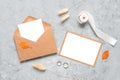 Wedding feminine invitation card template. Blank greeting card mockup, brown envelopes, wedding silver rings, dry grass lagurus