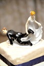 Wedding figurine with bride dragging the groom