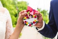 Wedding floral lock closeup in hands bride and Royalty Free Stock Photo