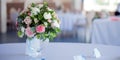 Wedding floristry. Beautiful lush bouquet on the table in restaurant Royalty Free Stock Photo