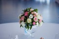 Wedding floristry. Beautiful lush bouquet on the table in restaurant Royalty Free Stock Photo