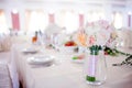 Wedding floristry. Beautiful lush bouquet on the table in restaurant Royalty Free Stock Photo