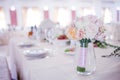 Wedding floristry. Beautiful lush bouquet on the table in restaurant Royalty Free Stock Photo