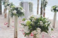 Wedding flower arch, post and decoration on beach Royalty Free Stock Photo