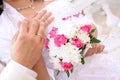 Wedding flower banch with newlyweds hands Royalty Free Stock Photo