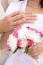 Wedding flower banch with newlyweds hands Royalty Free Stock Photo