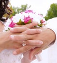 Wedding flower banch with newlyweds hands Royalty Free Stock Photo