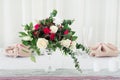 Wedding flower composition on table. Bouquet with roses with number three Royalty Free Stock Photo