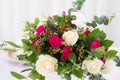 Wedding flower composition on table. Bouquet with roses with number three Royalty Free Stock Photo