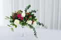 Wedding flower composition on table. Bouquet with roses with number three Royalty Free Stock Photo