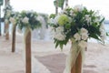 Wedding flower post on beach